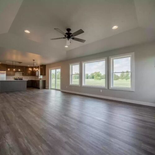 Image from a different angle of the kitchen in the Milestone floor plan, revealing additional aspects of its modern appliances, stylish design, and spacious layout, further illustrating the kitchen's functionality and appeal.