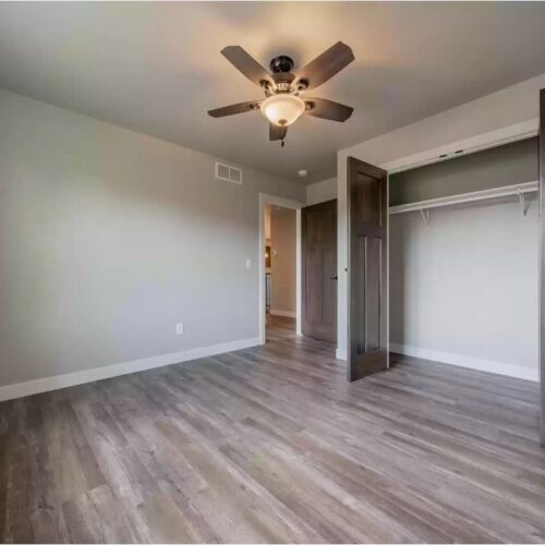Third image of the second bedroom in the Milestone floor plan, taken from a different angle. This perspective showcases other elements of the room's modern design and cozy layout, further illustrating the room's overall comfort and style.