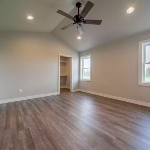 Image of the master bedroom in the Milestone floor plan, highlighting its spacious layout, elegant design elements, and a sense of luxury and comfort that characterizes the room.