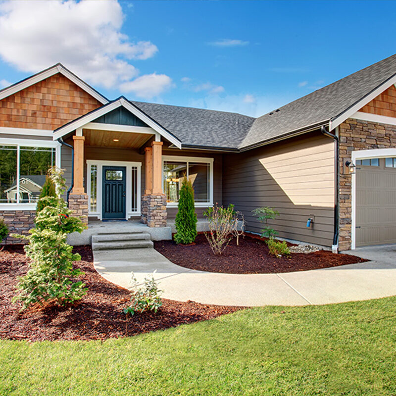 Image of a newly built home with a modern design, featuring clean lines and contemporary aesthetics.